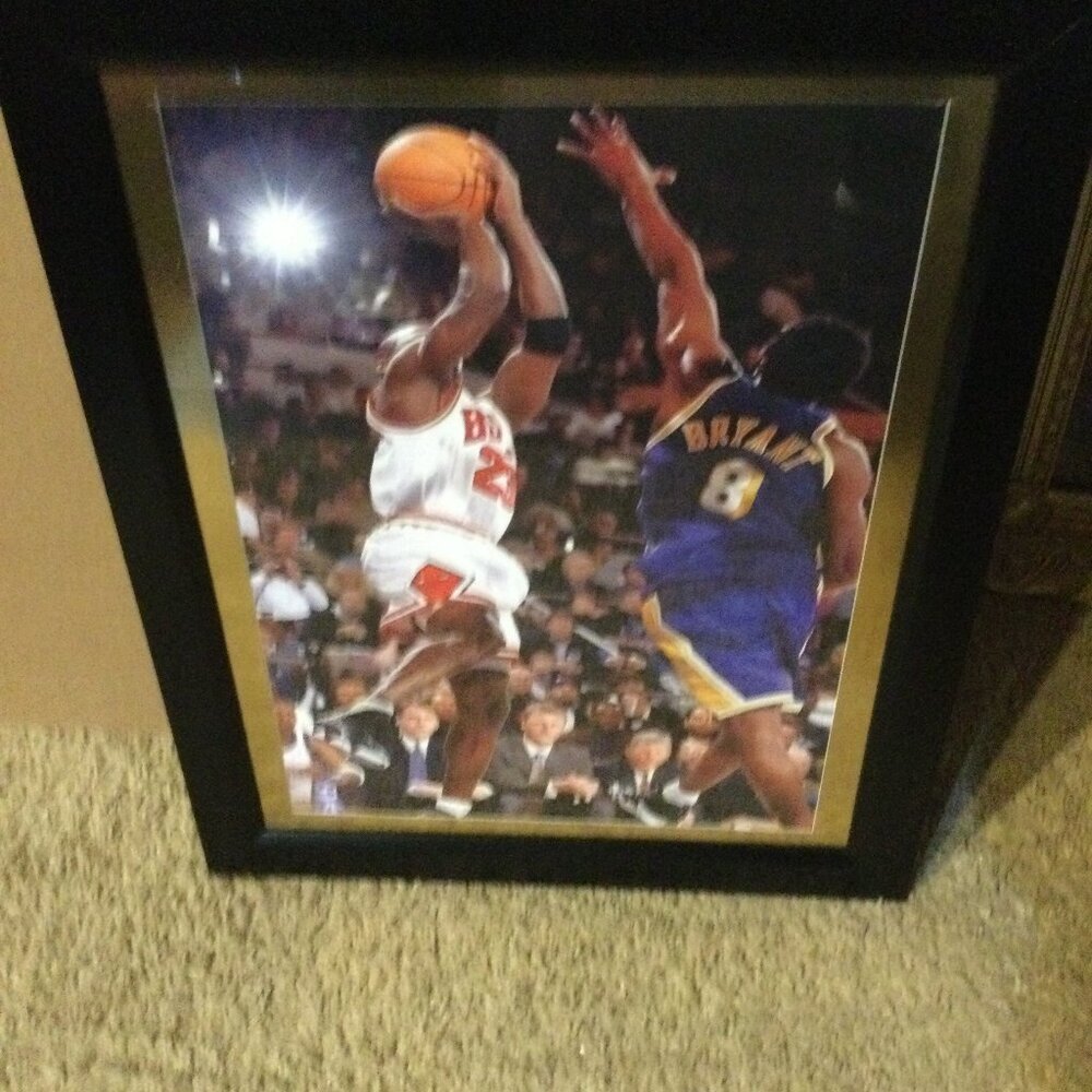 Mike and Kolby 2 champions square off in a black frame.